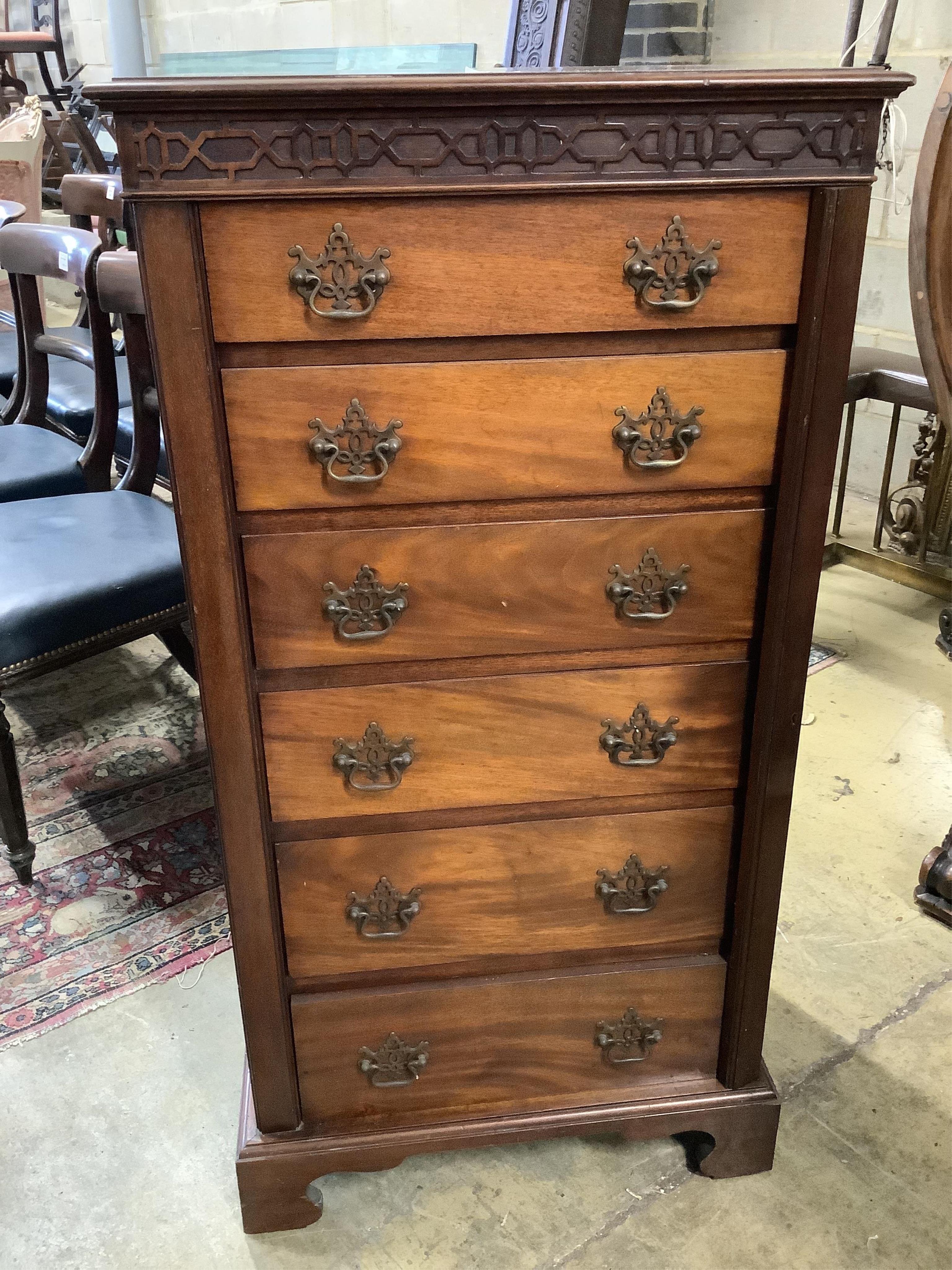 An Edwardian mahogany Wellington chest, width 58cm, height 114cm. Condition - fair to good